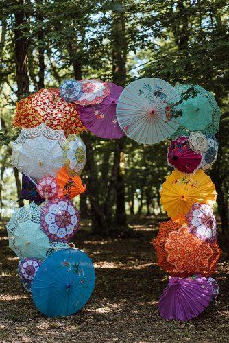 wedding decor 2019 arch with bright umbrellas theshannonsphotography