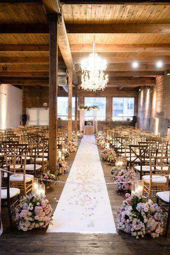 wedding decor 2019 industrial ceremony with pale pink roses and candles averyhouse