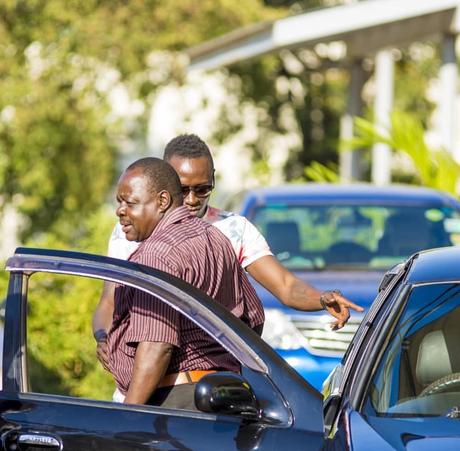 Obinna with his father when he surprised him with a new car 