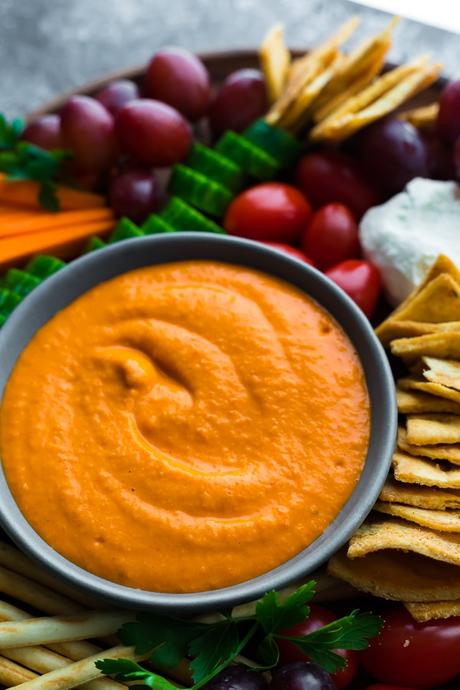 roasted red pepper hummus on an appetizer tray