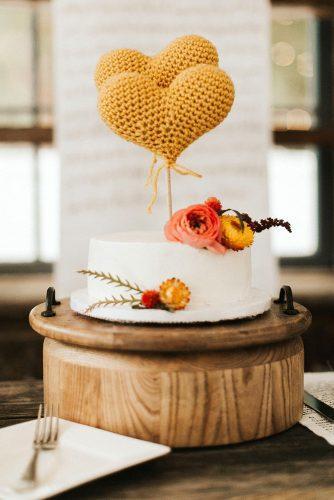 mustard wedding small rustic white cake with flowers and knitted heart jaicee morgan
