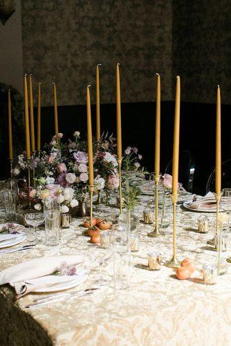 mustard wedding bridal table dark moody pale pink roses centerpiece many tall candles yeah! weddings
