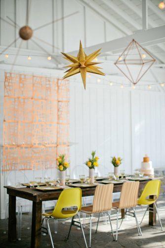 mustard wedding table reception with suspended geometry decor flower centerpieces kristyn hogan