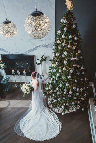 christmas wedding tree near bride elegant bridal reception everlasting moments