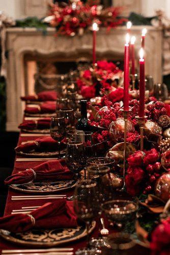 christmas wedding velvet red tablecloth balls centerpieces and candles samuellippkestudios