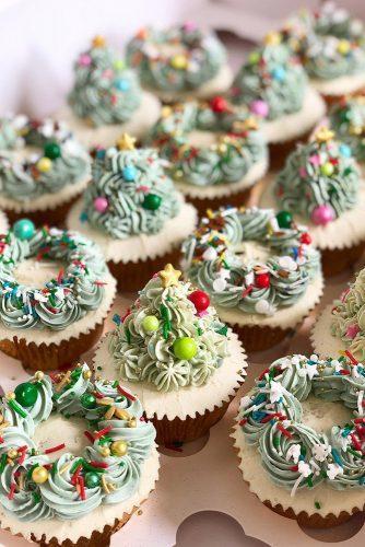 christmas wedding cupcake decor ideas with green pines poshlittlecakes
