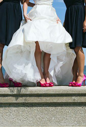 bridesmaids photos pink wedding shoes We Laugh We Love Photography