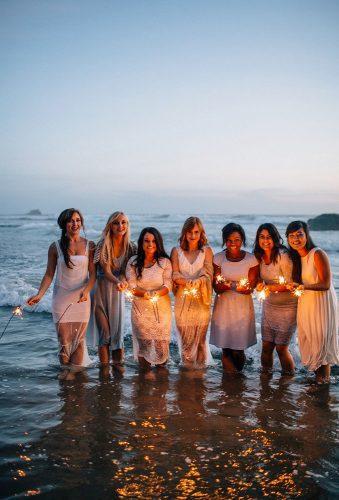 bridesmaids photos gilrs with sparklers bethanysmall