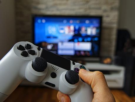 hand with a gaming controller