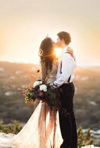 bohemian wedding photos kiss at sunset Holly Kringer Photography