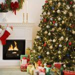 Photo of Christmas tree, presents, and fireplace