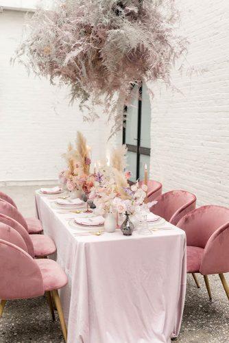 dusty rose wedding modern reception with hanging pampas grass and flower on table chrisandbeccaphoto