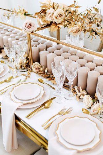 dusty rose wedding table with candles and gold details purpletreephotography