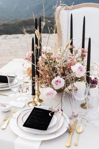 dusty rose wedding centerpiece with roses dry branches and candles pura soul photography