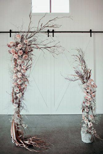 dusty rose wedding rustic arch with roses and branches ivy road photography
