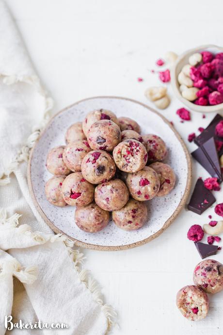 These Raspberry Dark Chocolate Energy Bites are deliciously filling and laced with the bold flavor of raspberries and shards of dark chocolate. They make the perfect gluten-free, paleo, and vegan snack or treat.