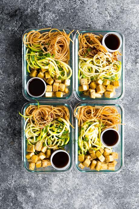 Spicy Tofu Noodle Meal Prep Bowls (vegan) in four meal prep containers