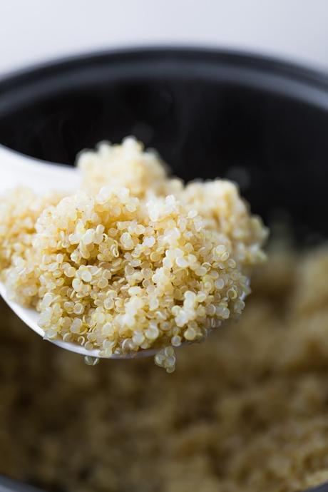 35+ meal prep tips from readers- close up shot of spoon with quinoa