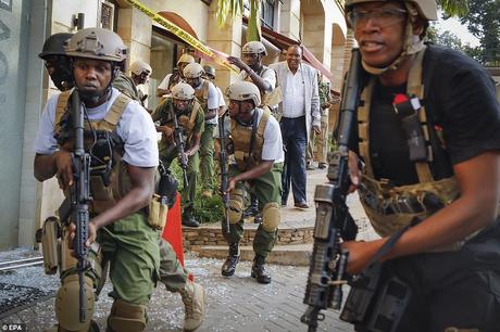 Members of the Kenyan special forces prepare to launch an attack against the terrorists at DusitD2 hotel 