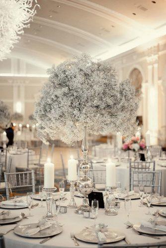 silver sage wedding tall silver with baby breath centerpiece catherine mead photography