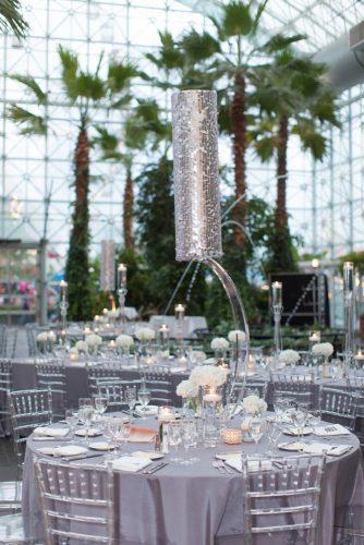 silver sage wedding round table with tall silver centerpiece miller + miller wedding photography