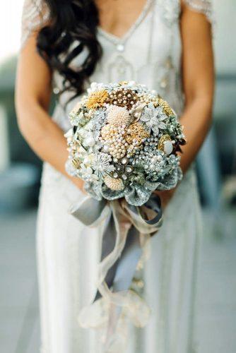 silver sage wedding bouquets with rhinestones ribbons and pearls a brit and a blonde