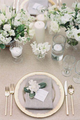 silver sage wedding gray and gold place setting with white flowers on the table lucy cuneo photography
