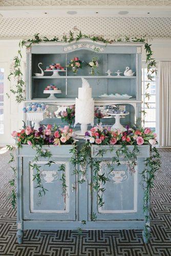 silver sage wedding buffet decorated with bright roses and greenery white modern cake ameliajohnsonphoto