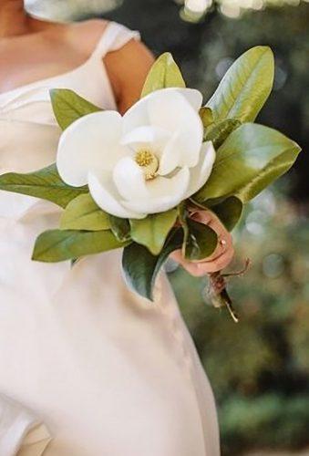 single stem wedding bouquets open magnolia heatherelizabethphotography