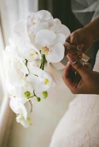 single stem wedding bouquets wedding orchid kirsten goslett photography