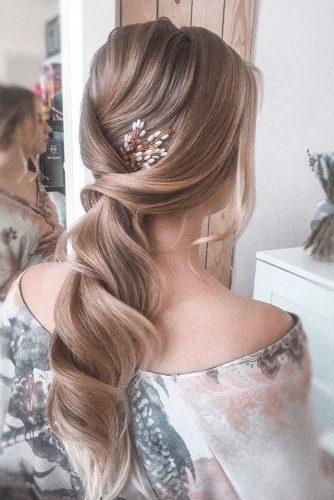 bohemian wedding hairstyles elegant long swept ponytail on blond hair olesya_zemskova_