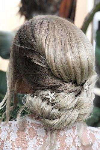 bohemian wedding hairstyles medium silver hair low updo with mermaid braids jessicadomoney