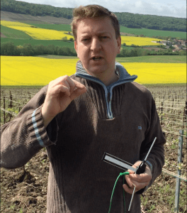 Franck Pascal with antenna in his bioenergetically-farmed Champagne vineyards. ©CarolineHenry 2016.