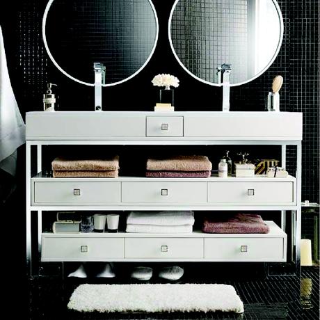 simple all white double sink standing vanity with cubby space and drawers