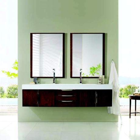 natural wood floating vanity with multiple cabinets and a white top double sink vanity