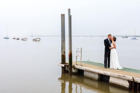 bride and groom in the mist at their aldeburgh yacht club wedding