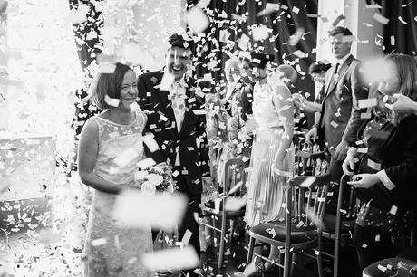 confetti after the ceremony for the bride and groom
