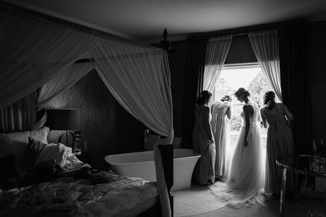 a quiet moment with the girls before a godwick barn wedding