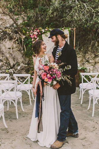 nautical wedding ceremony elegant bride with bright bouquet and groom in a marine suit michelle roller