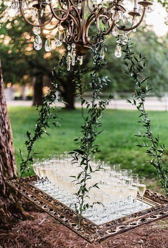 whimsical wedding decor ideas champange on the frame amiliaphotography