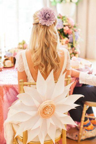 whimsical wedding decor ideas big flower on chair Roberta Facchini