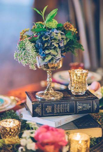 whimsical wedding decor ideas centerpiece with book Ed Aileen Photography