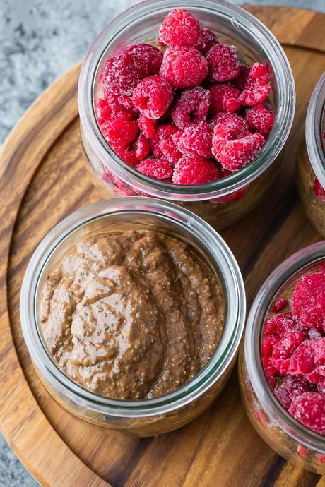 overhead view of chocolate chia pudding in jars