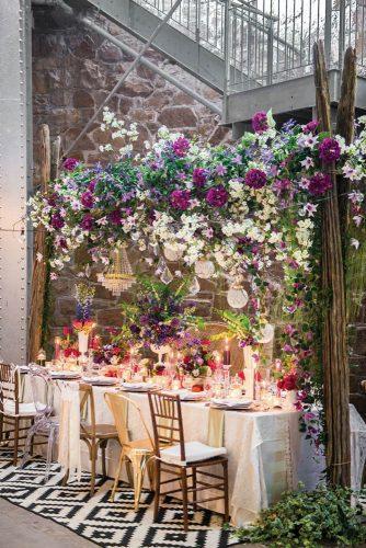 bohemian wedding decorations flower table reception with candles madi photography