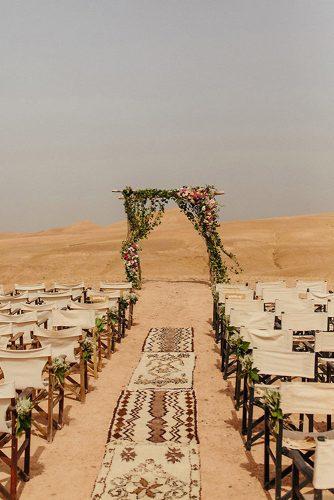 bohemian wedding decorations outdoor ceremony in desert petar jurica