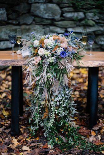 bohemian wedding decorations moody greenery and colorful wildflowers tablerunner hope helmuth