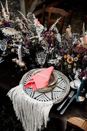 bohemian wedding decorations place setting moody table setting with bright wildflowers lilly red creative