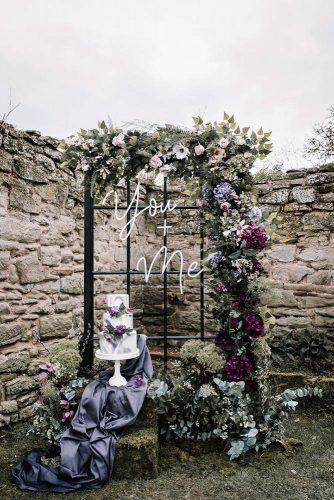 bohemian wedding decorations old window frame with neon signs flowers and boho bridal cake oobaloosphotography