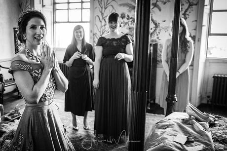 Bridesmaids assist Bride at St Giles House