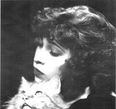 Tarpe Mills with her beloved Persian cat.